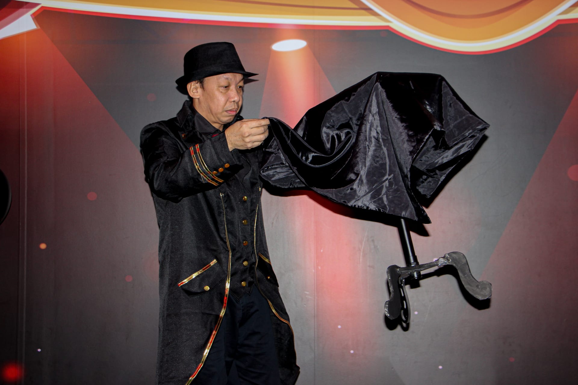 Magician entertaining children at a party