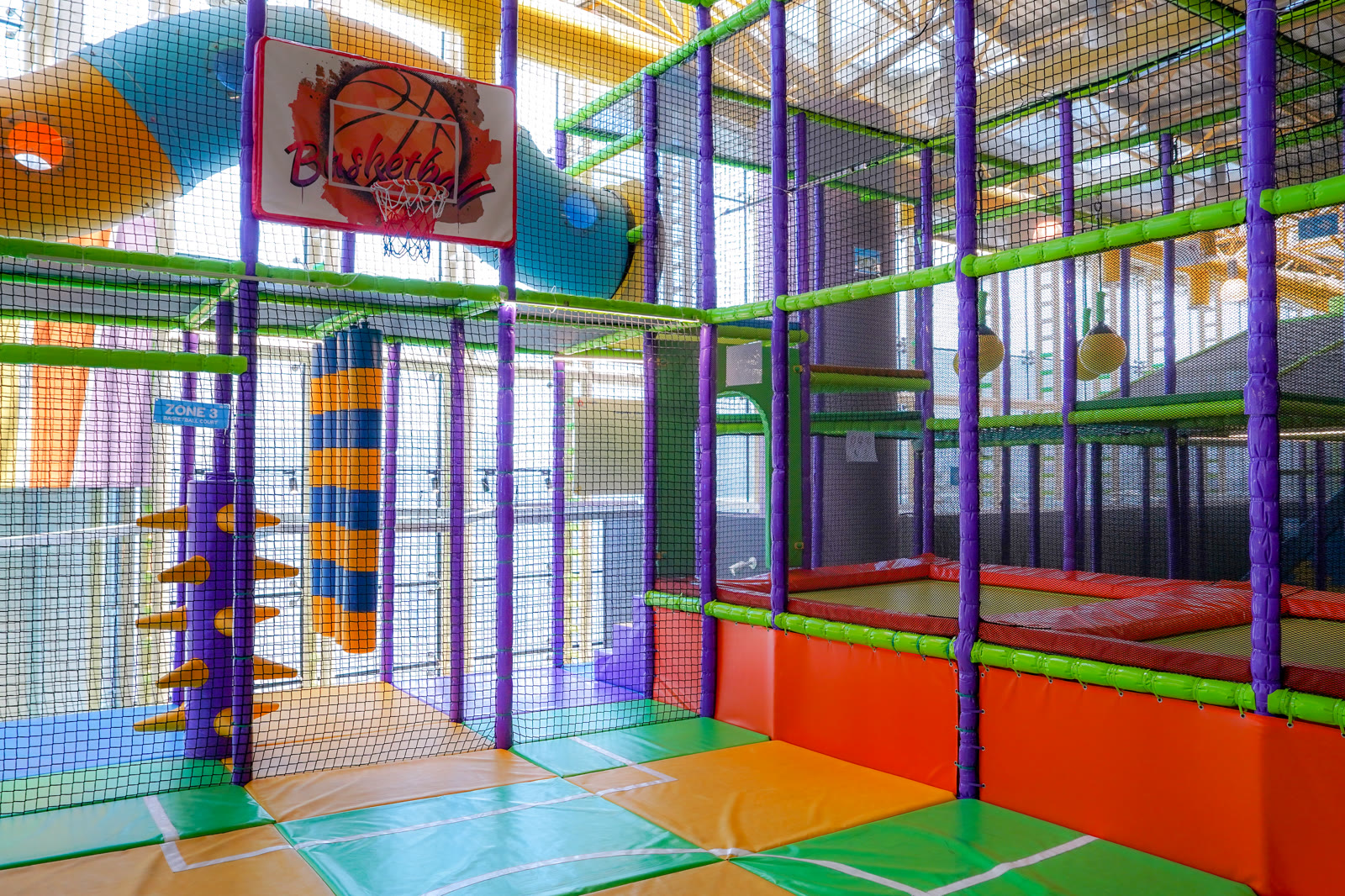 Kids climbing inside the soft play structure